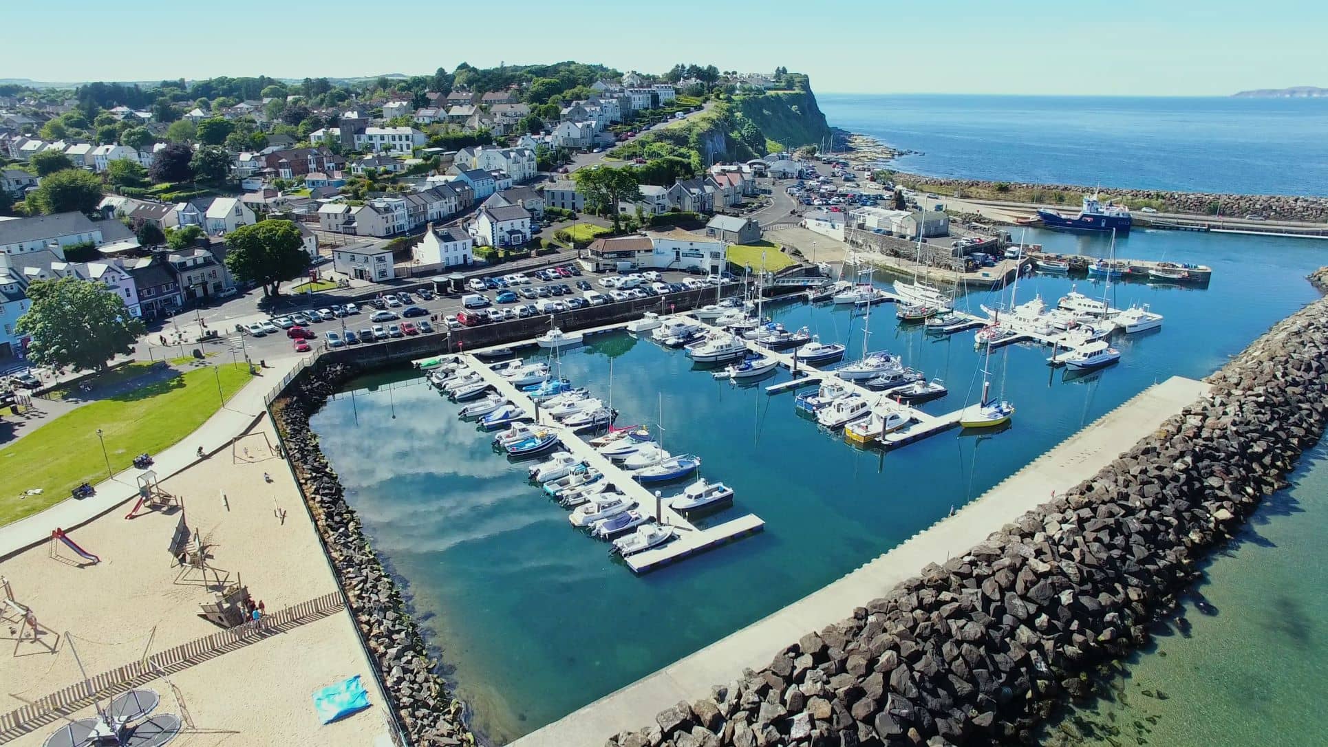 Ballycastle Marina from the air in the sun
